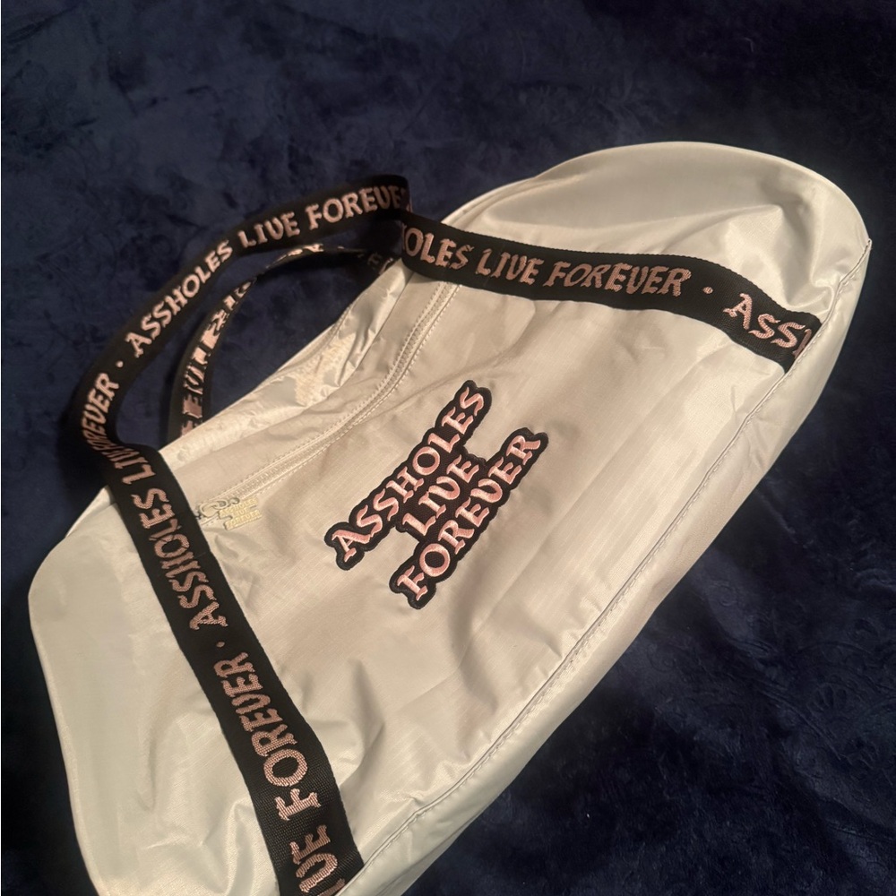 A**Holes Live Forever Emotional Baggage Light Blue Duffel Bag View 2